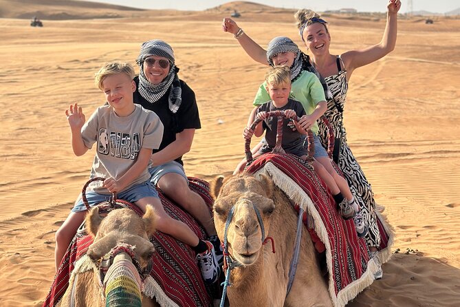 Dubai Private Morning Safari with Camel Ride - Sandboarding gives the dunes a second kind of thrill