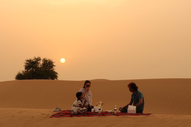 Dubai Private Sunset Desert Drive with Wildlife Experience - Leaving Dubai in a private Land Cruiser