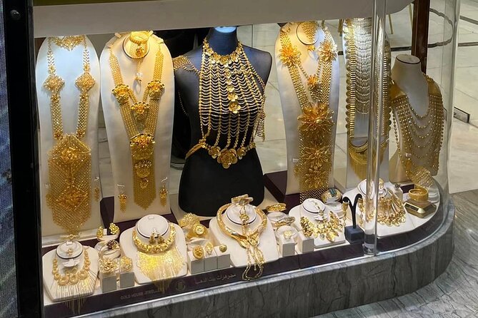 Dubai Private Tour of Creek, Souks, Frame, and Burj Khalifa Entry - Gold, spice, and old souks in Deira