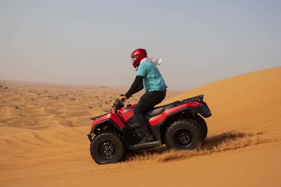 Dubai: Quad & ATV Bike, Red Dune Desert and Safari Adventure - Sandboarding, photos, and a five-minute camel ride