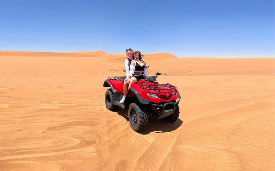 Dubai: Quad Bike, Dune Buggy, and Sandboarding Experience - Choosing between a quad bike and dune buggy