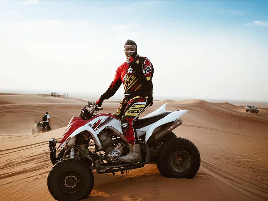 Dubai: Quad Bike or Dune Buggy Adventure & Optional Transfer - Red dunes, not just a photo stop