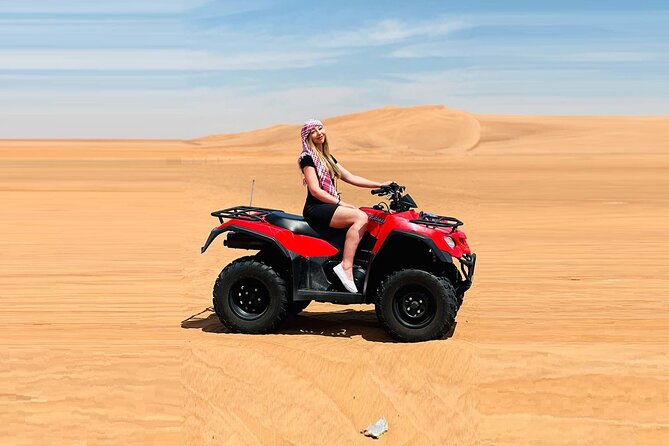 Dubai: Quad Bike Safari, Camels, & Camp with BBQ Dinner - Sandboarding, photos, and the short camel ride