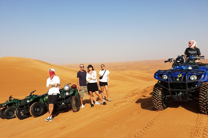 Dubai: Quad Bike Safari, Camels, & Camp with BBQ Dinner - Belly dancing, tanoura, and the evening program
