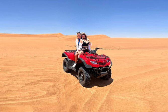 Dubai: Quad Bike Safari, Camels, & Camp with BBQ Dinner - Hotel pickup and the 45-minute ride out