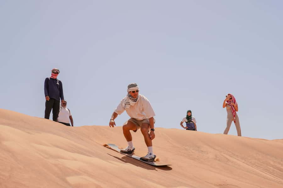 Dubai: Red Dune Desert Safari, Quad Bike, Camels, and BBQ - Quad biking: exciting, optional, and at your own risk