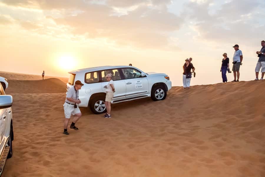 Dubai: Red Dune Safari, Quad Bike, Camel Ride, BBQ Dinner - Sunset over the red dunes