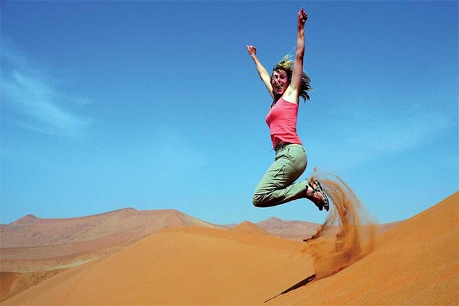 Dubai Red Dune Safari with BBQ Dinner and Live Shows - The Bedouin-style camp after sunset