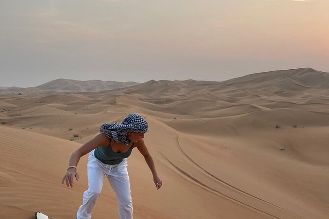 Dubai Red Dunes Afternoon Desert Safari with Camel Ride - Falconry, Arabic clothing, and henna at camp