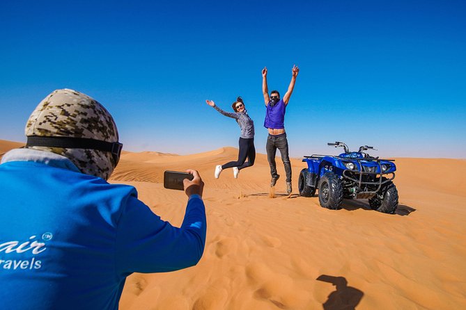 Dubai Red Dunes ATV, Camels, Stargazing & 5<em> BBQ Al Khayma Camp – Key points to know before booking’ /></p>
<ul>
<li><strong>Red-dune ATV ride:</strong> You get about 60 minutes on a quad bike after a safety briefing, with an instructor nearby.</li>
<li><strong>Al Khayma Camp dinner:</strong> The evening includes a 5-star Arabic buffet, live BBQ station, local bread, vegetarian and nonvegetarian choices, and desserts.</li>
<li><strong>A full activity schedule:</strong> Camel riding, camel feeding, sandboarding, henna for women, falcon photos, Arabic clothing, shisha, and sunset photos are included.</li>
<li><strong>Evening slots are best:</strong> Fire shows and stargazing are part of the evening program, not the 11:30 AM departure.</li>
<li><strong>Self-driving has real risk:</strong> You must be over 14, have basic driving knowledge, sign an indemnity form, and accept responsibility for damage or injury.</li>
<li><strong>Pickup is included:</strong> Transfers from selected Dubai, Sharjah, and Ajman locations use an air-conditioned vehicle, with possible extra fees for some addresses.</li>
</ul>
<h2 id="why-this-six-hour-desert-tour-works">Why this six-hour desert tour works</h2>
<p><img width="669" height="446" decoding="async" src=