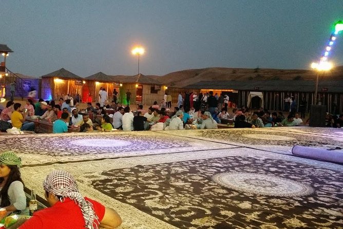 Dubai Red Dunes Desert Safari,ATV Quad Bike Camel Ride&BBQ Dinner - Sandboarding for a short burst of fun