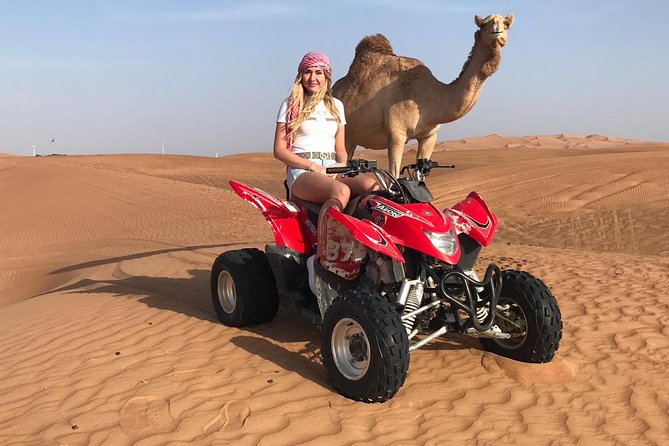Dubai Red Dunes Desert Safari,ATV Quad Bike Camel Ride&BBQ Dinner - BBQ dinner, drinks, and live performances