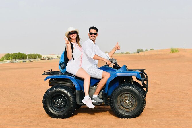 Dubai: Red Dunes Desert Safari, Camel ride, Sandboard, Quad Bike - Sunset photos are built into the timing