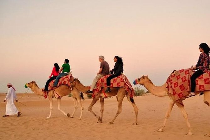 Dubai Red Dunes Desert Safari : Sandboarding, BBQ & Live Shows - A traditional welcome at the camp