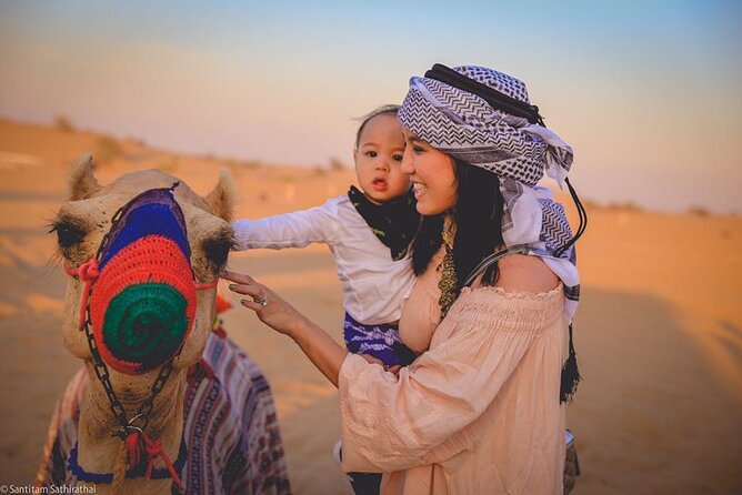 Dubai Red Dunes Desert Safari, With BBQ, Camel Ride, Sand Boarding And Much More - Sandboarding and camel riding at the desert camp