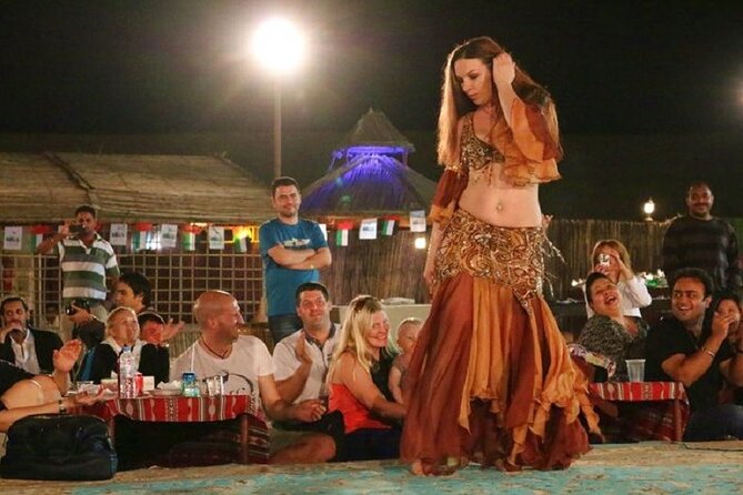 Dubai Red Dunes Desert Safari, With BBQ, Camel Ride, Sand Boarding And Much More - Dinner, drinks, and the evening stage show