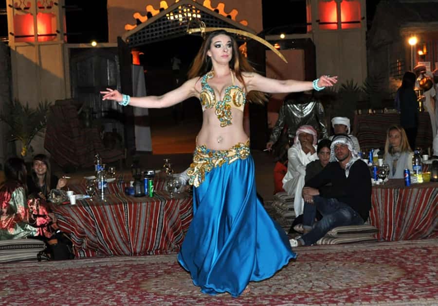 Dubai: Red Dunes Desert Safari with Premium Camp BBQ & Shows - Sandboarding adds an easy burst of adventure
