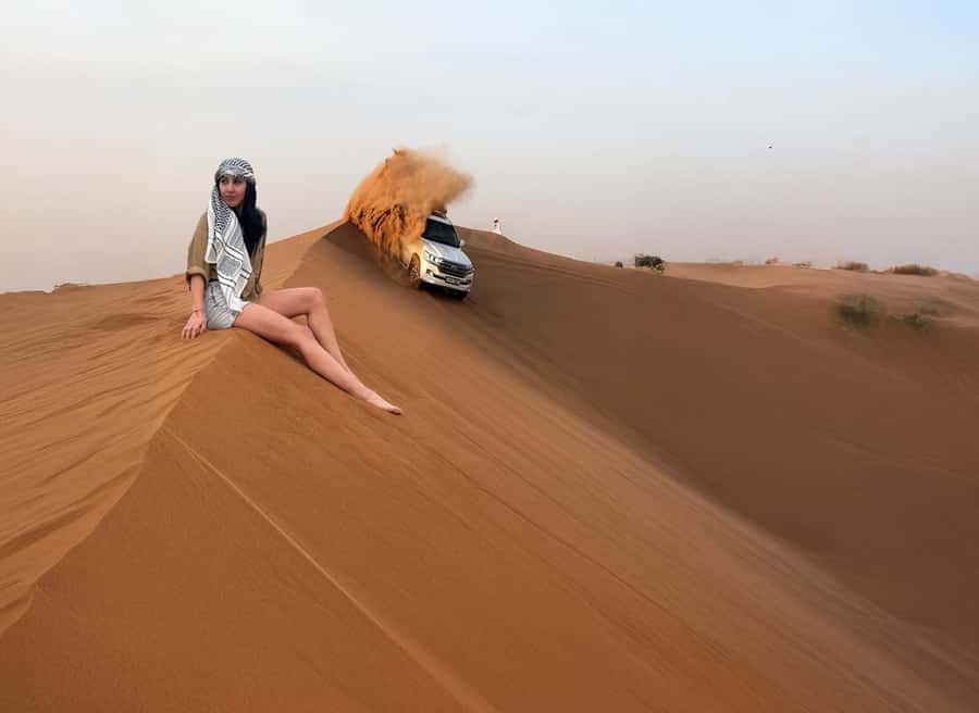 Dubai: Red Dunes Desert Safari with Premium Camp BBQ & Shows - A quick camel ride and a close look at falconry