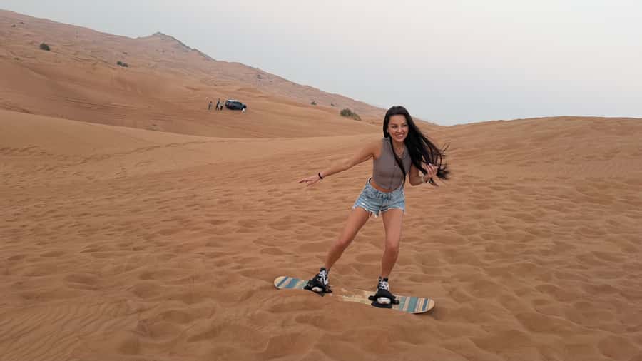Dubai: Red Dunes Evening Quad Bike, Dune Blast with BBQ - Quad biking across the red sand