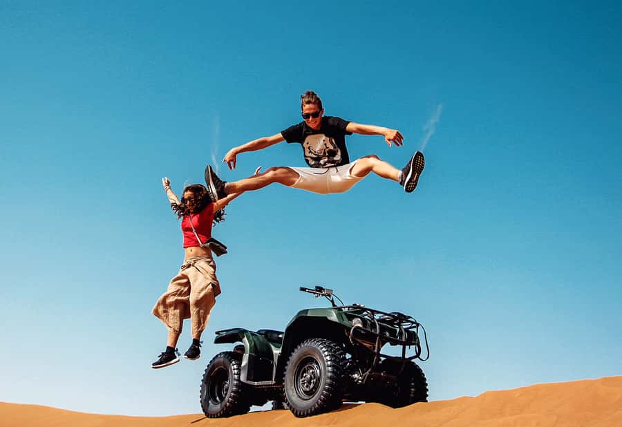 Dubai: Red Dunes Quad Bike with Sandboarding, Camels and BBQ - Key points to know before booking