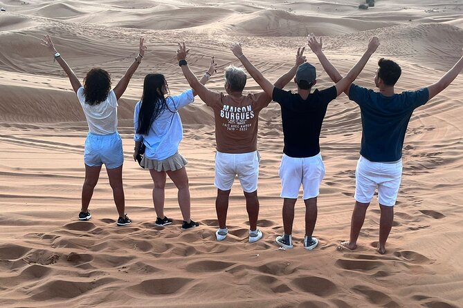 Dubai Red Dunes Safari, ATV, Camel ride, BBQ at Desert Camp - BBQ dinner, tea, and evening entertainment