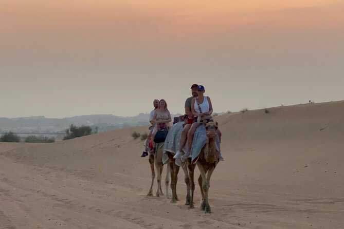 Dubai Red Dunes Safari, Camel Ride & Live BBQ - Tanoura, fire, and belly-dance shows
