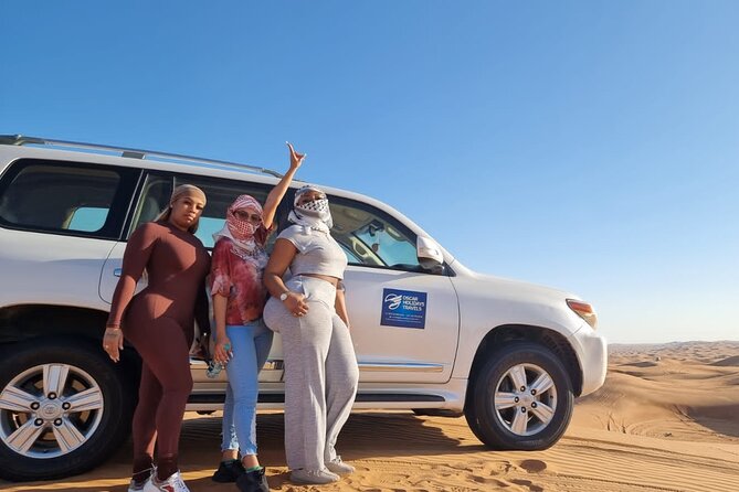 Dubai Red Dunes with Sandboarding, Camel Ride, Falcon & VIP Camp - Timing, group size, and what the $55.82 covers