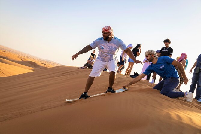 Dubai Red Dunes with Sandboarding, Camel Ride, Falcon & VIP Camp - Hotel pickup and the ride toward the dunes