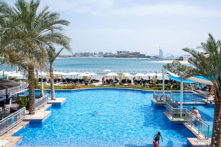 Dubai: Riva Beach Club Pool and Beach Day Pass - Arriving at the pool and private beach