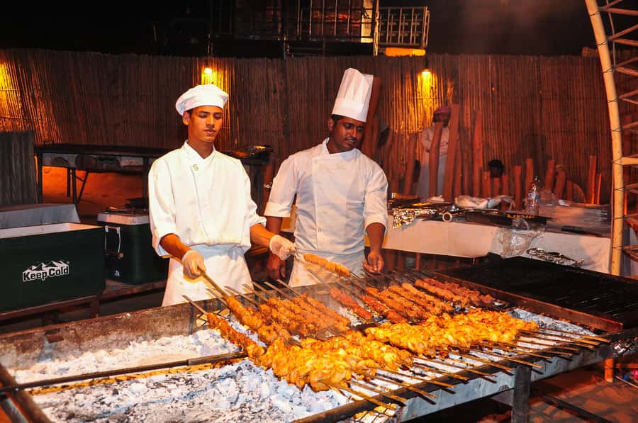Dubai: Safari, Quad Bike, Camel Ride, and Buffet Dinner - Dune bashing across Lahbab’s red sand