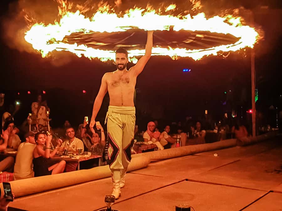 Dubai: Safari, Quad Bike, Camel Ride, and Buffet Dinner - Sandboarding and the sunset photo stop
