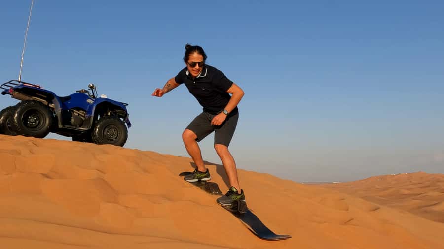 Dubai: Sandboarding, Camel Ride and Red Dune Bashing - Optional quad biking in the open desert