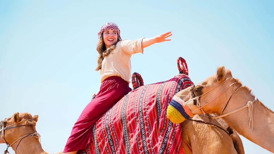 Dubai: Sandboarding, Camel Ride and Red Dune Bashing - Guides can shape the whole morning