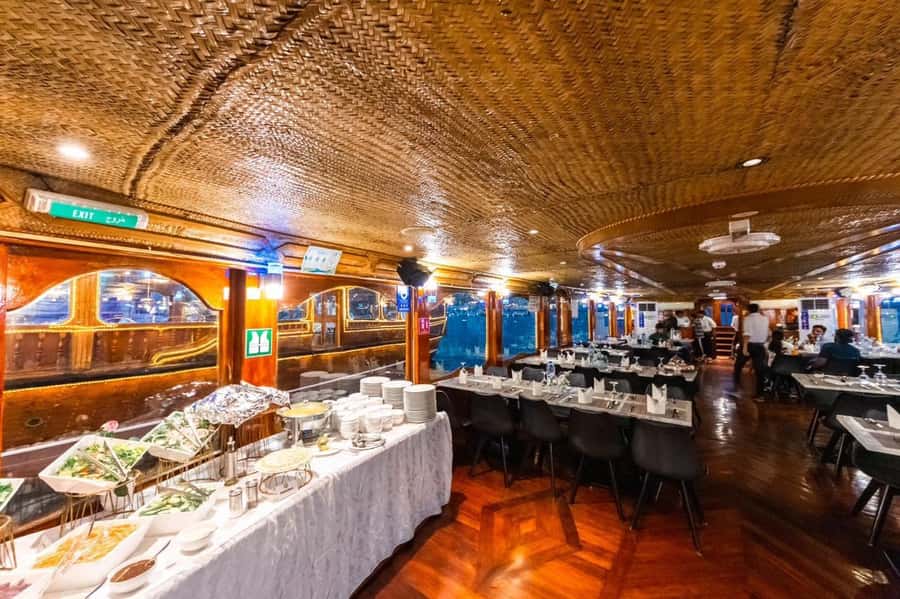 Dubai: Scenic Dhow Cruise with Buffet Dinner and Live Shows - A traditional dhow, not a luxury yacht