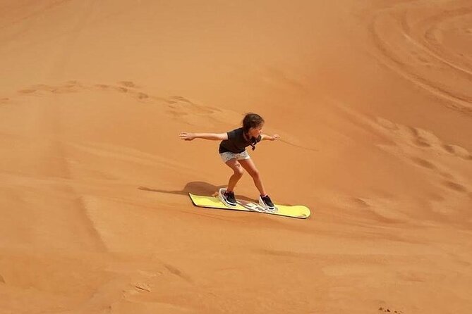 Dubai Self-drive Quad Bike, Sand Boarding, Camels & Refreshments - Who will enjoy this Dubai desert morning