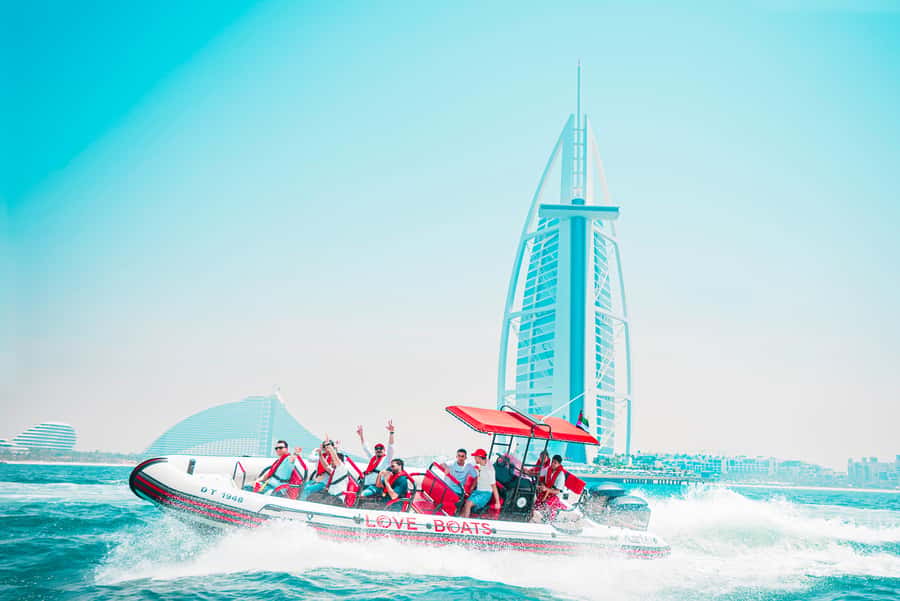 Dubai: Sightseeing Speedboat Tour with Live Tour Guide - The ride itself: smooth in the Marina, lively outside