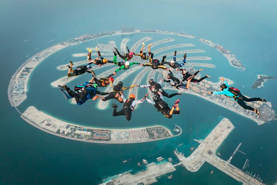 Dubai: Skydive at The Palm with Photos, Video & Yacht Tour - The slower parachute ride and landing