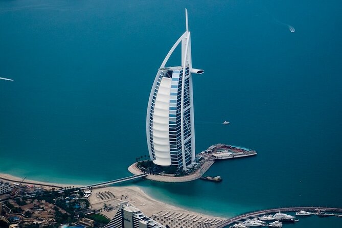 Dubai stopover tour with airport transfers & flexible durations - Jumeirah Beach and the Burj Al Arab photo stop