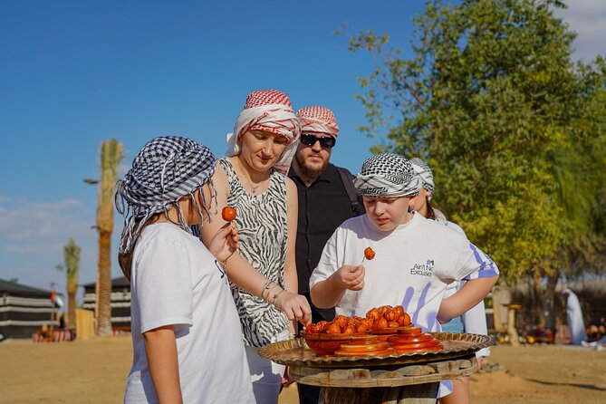Dubai: Sunset Camel Trek, Al Khayma Camp, Stargazing & BBQ - Horses, Yola Dance, Falconry, and Fire