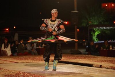 Dubai Sunset Camel Trekking with Shows & BBQ Dinner