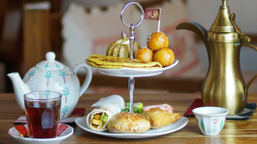 Dubai: Sunset Cruise on Traditional Boat & Emirati High Tea - Boarding the wooden Abra