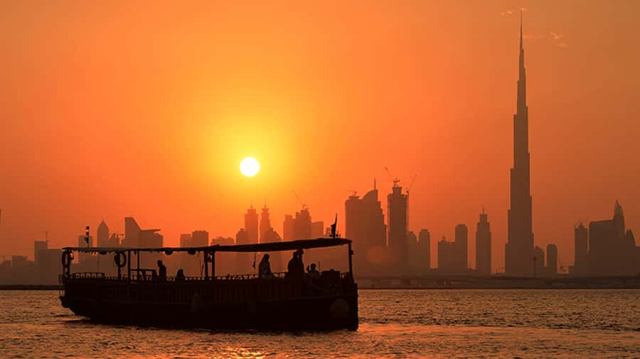 Dubai: Sunset Cruise on Traditional Boat & Emirati High Tea - Waiting for Burj Khalifa at sunset