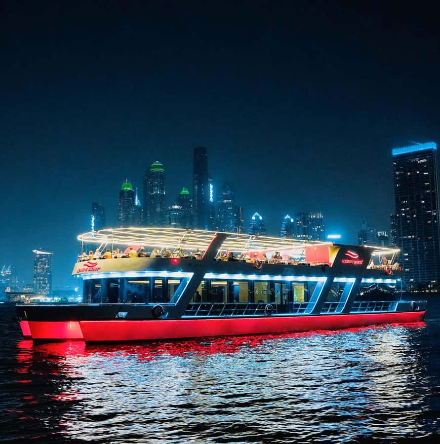 Dubai: Sunset or Dinner Cruise with Live Music & Open Bar - Boarding the yacht and finding your table