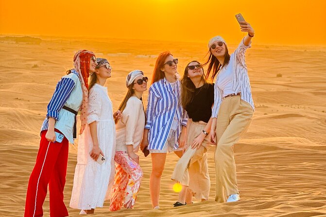 Dubai Sunset Red Dune Desert Safari, Sandboarding and Camel Ride - A four-hour desert escape from Dubai