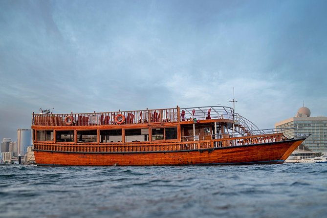 Dubai Super Saver: Desert Camp Experience by 4x4 and Dhow Dinner Cruise - Boarding the Dhow on Dubai Creek