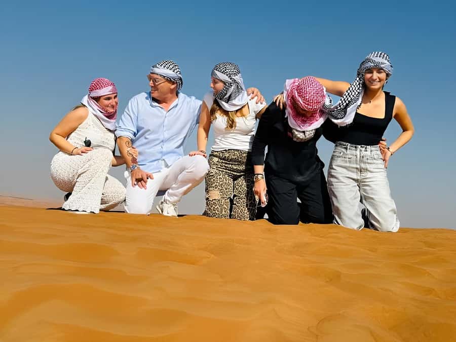 Dubai: Tour with BBQ Dinner, Camel Ride, & Traditional Show - Dune bashing and sandboarding for the action-minded