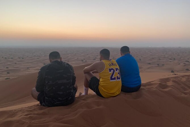 Dubai: Unique SUNRISE 4WD Red Dunes Safari - Trying sandboarding on soft red sand
