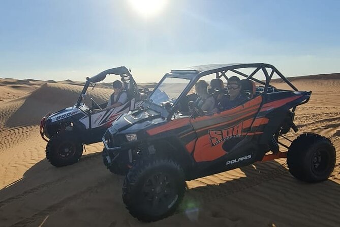 Dubai: Unique SUNSET Buggy Red Dunes Safari - Sandboarding and the short camel ride