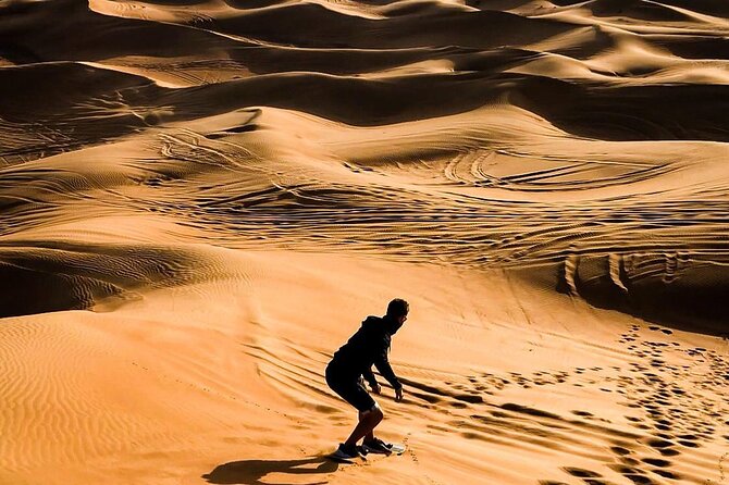 Dubai Unique Sunset Combo: 4WD and Quad Bike Red Dunes Safari - Dinner and entertainment at the desert camp