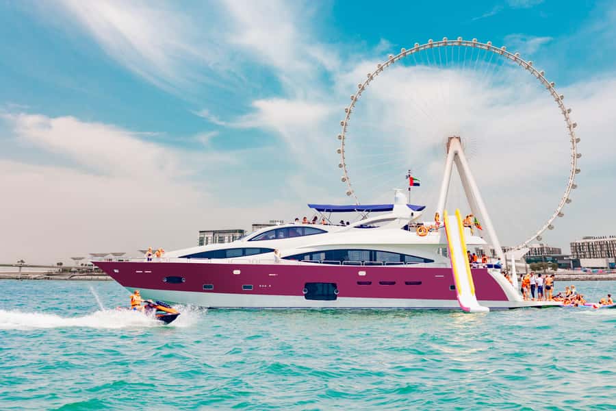 Dubai: Yacht Cruise with Swimming, Snorkeling and BBQ Lunch - Slide, pool, inflatables, and optional jet skis